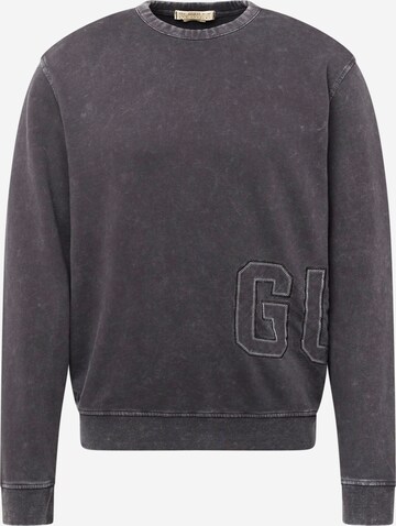 Sweat-shirt GUESS en noir : devant