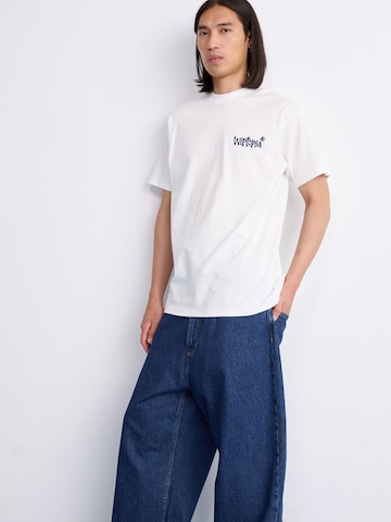 Carhartt WIP Baggy Jeans 'Brandon' in Blau