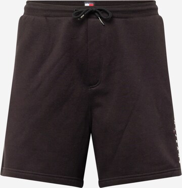 Tommy Jeans Loosefit Shorts in Schwarz: predná strana