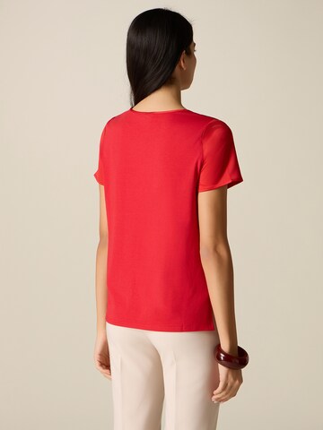 Maglietta di oltre in rosso