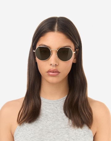 Lunettes de soleil 'AURA' HAWKERS en or : devant