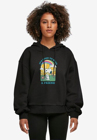 Merchcode Sweatshirt 'Peanuts - It's good to have a friend' in Black: front
