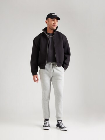 ELLESSE Zúžený strih Nohavice 'Cravo 2' - Sivá