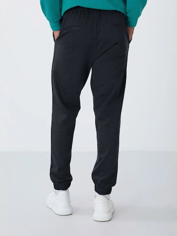 Tapered Pantaloni di Tommy Life in nero