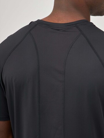 SNOCKS Functioneel shirt in Zwart