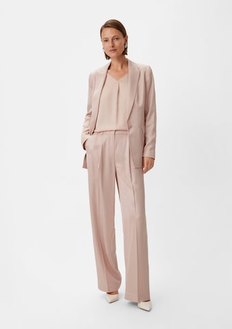 Wide leg Pantaloni con piega frontale di COMMA in beige