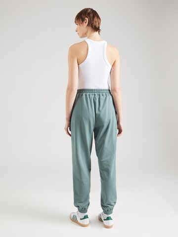 Effilé Pantalon 'Naomi' ABOUT YOU en vert