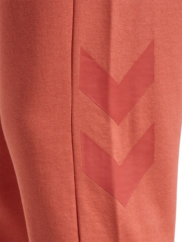 Hummel Tapered Sportbroek in Oranje