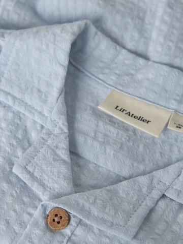 Lil'Atelier - Pijama entero/body en azul