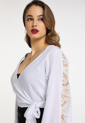 Camicia da donna di faina in bianco