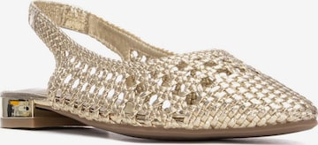 Xti - Sandalias en oro: frente