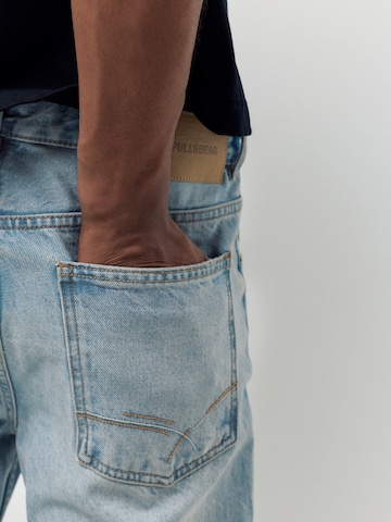Pull&Bear Flared Jeans in Blau