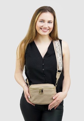 HARPA Crossbody bag in Brown: front