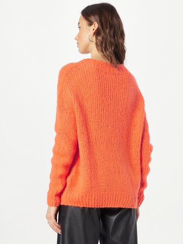 OUI - Pullover em laranja