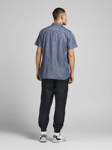 JACK & JONES جينز مضبوط قميص 'Portland' بلون أزرق