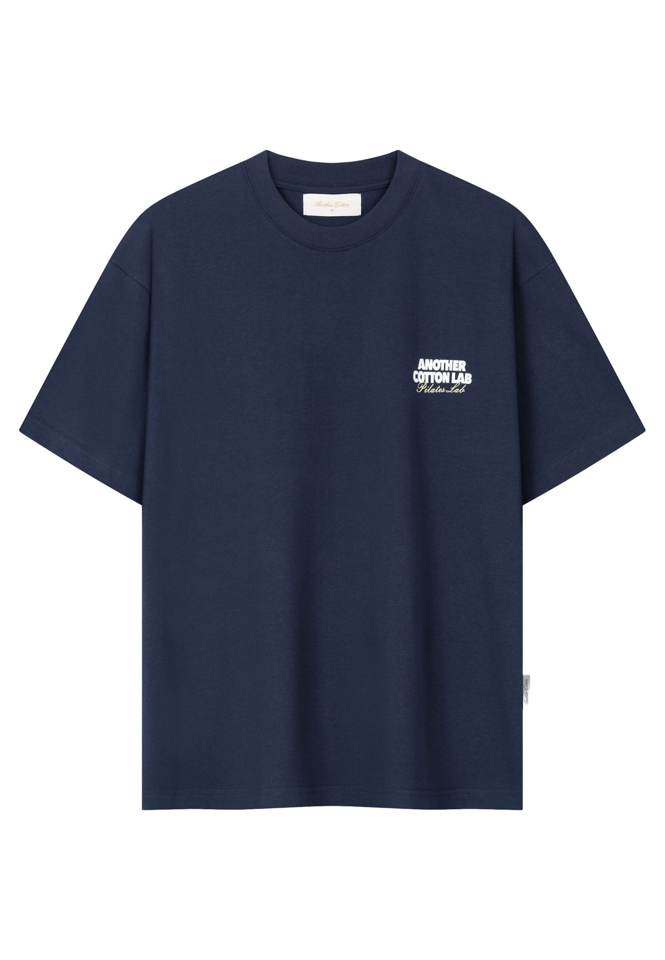 Another Cotton Lab T-Shirt 'Community Clubhouse ' in Blau: Vorderseite