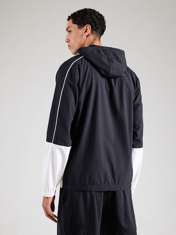 Veste de sport 'Challenger' UNDER ARMOUR en noir