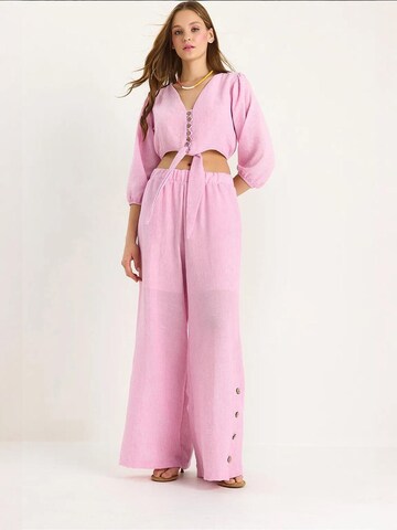 Completo pantalone di Bianco Lucci in rosa