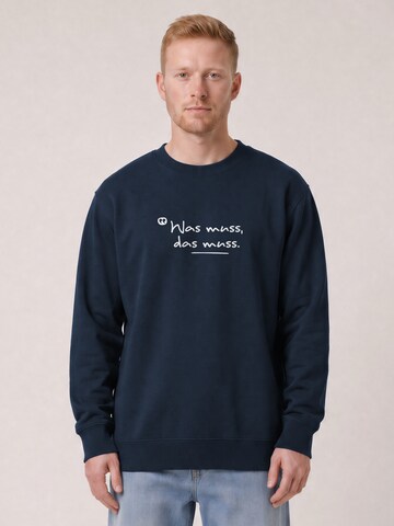 Sweat-shirt 'Was muss das muss' Watapparel en bleu : devant