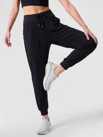 Tapered Pantaloni sportivi di Tommy Life in nero