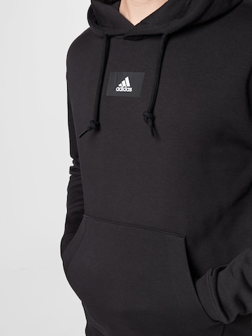 ADIDAS SPORTSWEAR Спортен блузон 'Essentials Feelvivid  Fleece Drop Shoulder' в черно