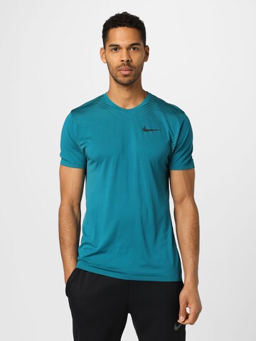 T-Shirt fonctionnel NIKE en bleu : devant