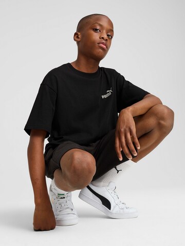 PUMA - Camiseta 'ESS No. 1' en negro