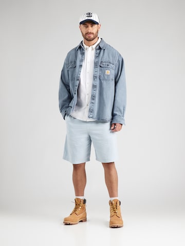 Carhartt WIP Loosefit Kalhoty 'Toland' – modrá