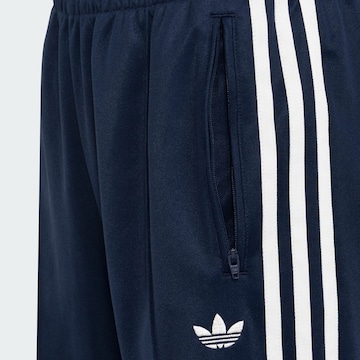 Loosefit Pantalon de sport '2IN1 FIREBIRD LOOSE LACE SKIRT' ADIDAS ORIGINALS en bleu