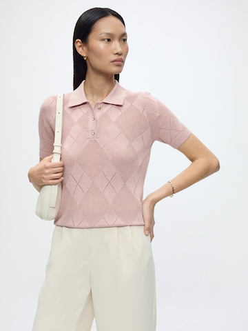 GUESS Sweter w kolorze różowy