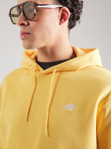 Felpa 'Sport Essentials' di new balance in giallo