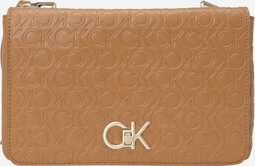 Calvin Klein Crossbody Bag in Brown: front