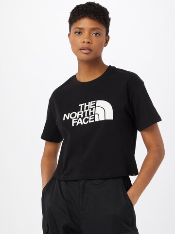 THE NORTH FACE Тениска в черно: отпред