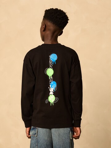 Tricou de la Next pe negru