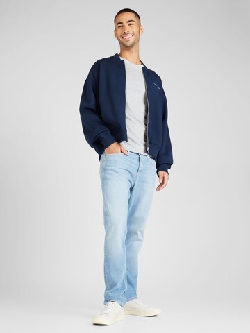 Tommy Jeans Sweat jacket in Blue: front