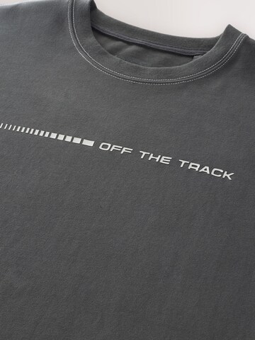 T-Shirt Next en gris