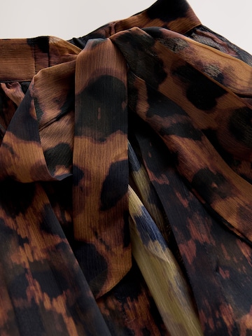 Next Strandrock in Braun