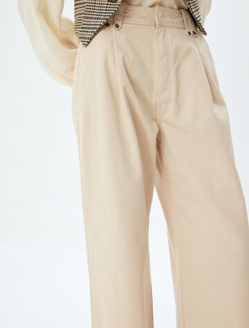 Koton Loose fit Pleat-front trousers in Beige