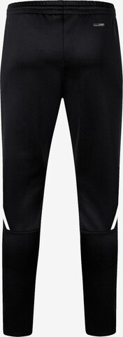 Effilé Pantalon de sport JAKO en noir