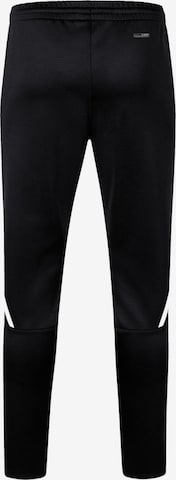 Tapered Pantaloni sportivi di JAKO in nero