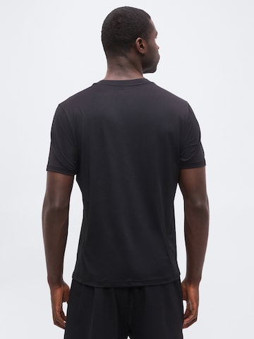 Champion - Camiseta funcional en negro