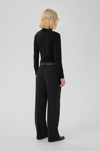 My Essential Wardrobe - Jersey en negro