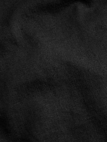 Top di Marks & Spencer in nero