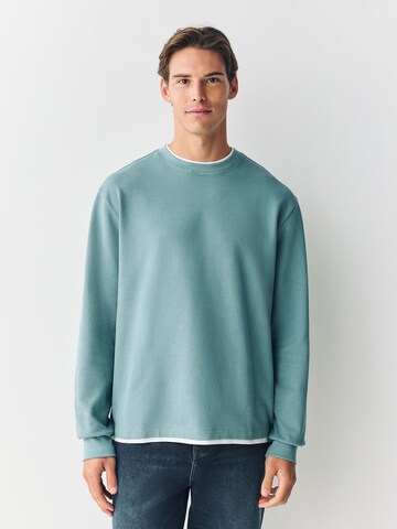 Tricou de la Next pe verde: față