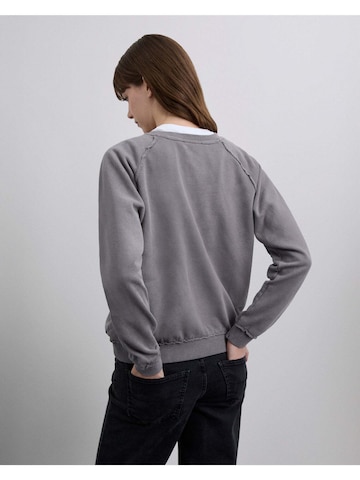 Felpa 'Kiss' di Scalpers in grigio