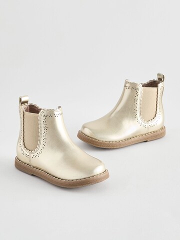Bottes Next en or