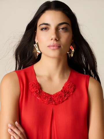 Camicia da donna di oltre in rosso