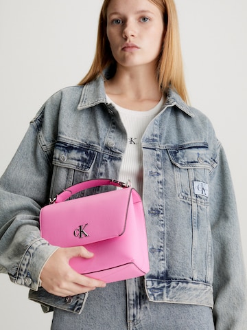 Poșete de la Calvin Klein Jeans pe roz: față