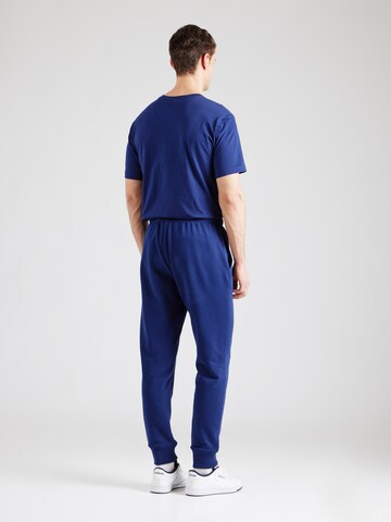 Champion Authentic Athletic Apparel Tapered Hose in Blau