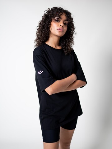 UNFOLLOWED x ABOUT YOU - Camiseta 'RARE' en negro: frente